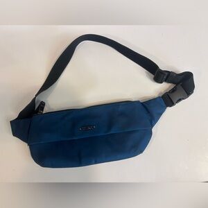 Tumi Voyageur Juno Slim Hip Bag in dark turquoise